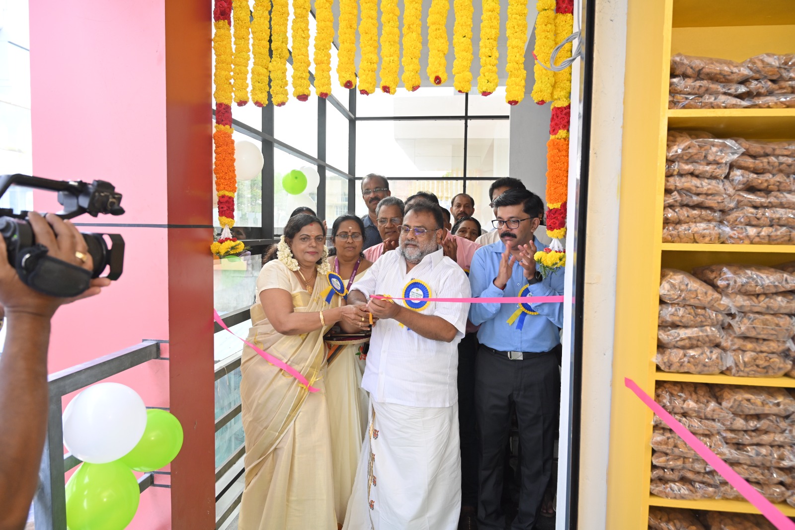 Cutting the ribbon at the opening of the company's office