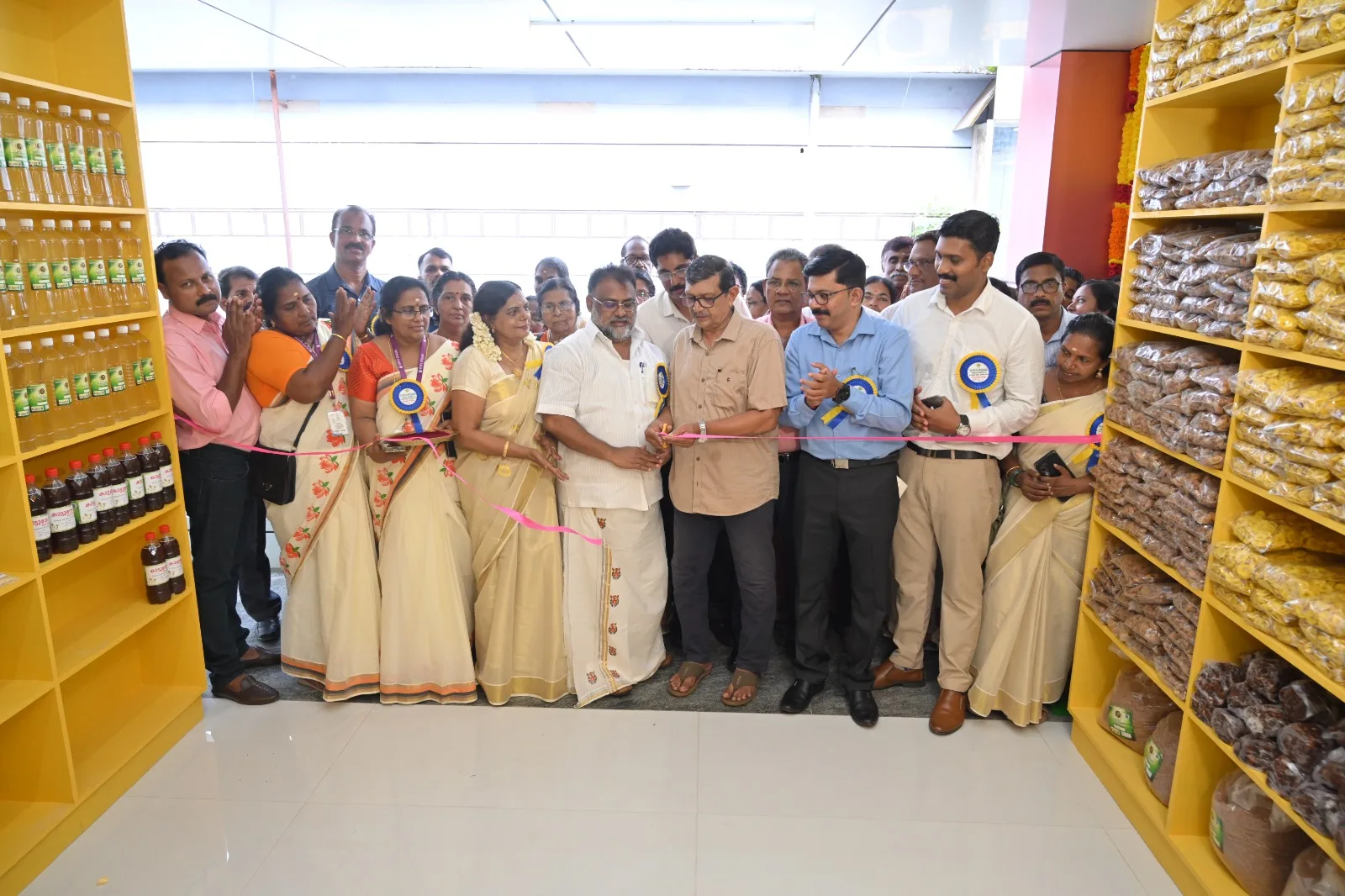 Members and staff at the opening of the Rithi's Upasana store